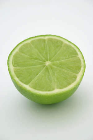 Lime half on a white backgroundの写真素材