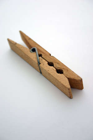 Wooden peg on white backgroundの写真素材