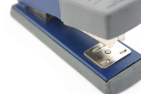 Blue and grey stapler on a white background