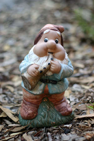 Garden gnome playing a saxaphoneの写真素材