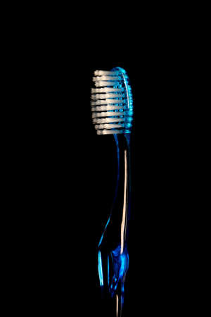 Blue closeup of a toothbrushの写真素材