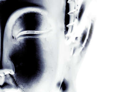 Half a buddha face with an artistic touchの写真素材