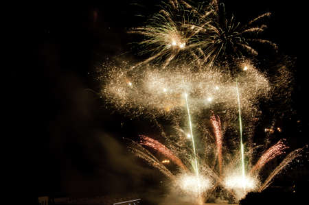 Several firework exploding on a long shutterspeed settingの写真素材