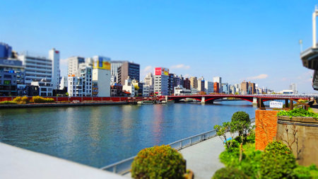Osaka cityscape with a river.