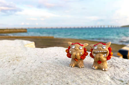 Shisa and the sea, most beautiful in the Orient Yonaha Maehama beachの写真素材