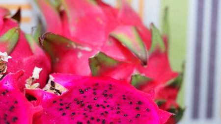 A vibrant cross-section of fresh dragon fruit, a tropical delicacyの写真素材