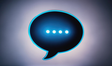 A blue neon speech bubble with three dots, indicating loading or waiting, on a gray backgroundの素材