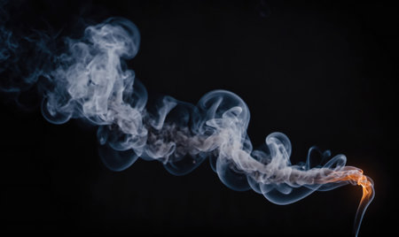 A long, curling stream of smoke rises from a lighterの素材