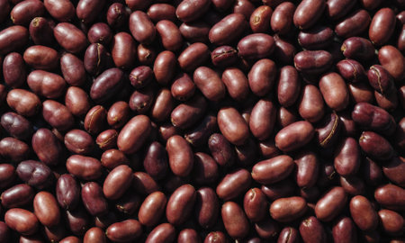 A close-up of roasted coffee beans, ready to be brewed into a delicious cup of coffeeの素材