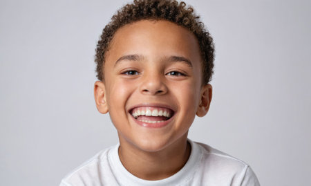 A young boy with a smile on his faceの素材