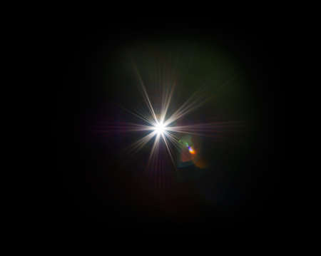 Colorful lens flare effect. Solar flare with rays and spotlights backgroundの写真素材