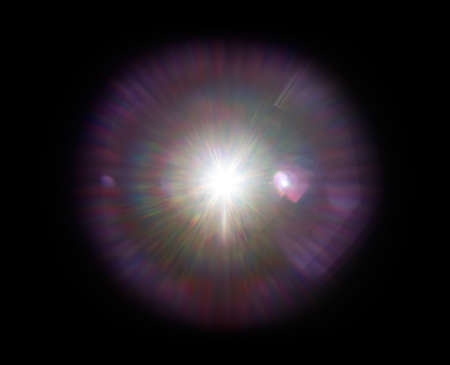 Colorful lens flare effect. Solar flare with rays and spotlights backgroundの写真素材