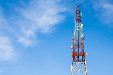 Communications Tower Satellite pole red and white at right on a white background isolated