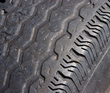 Automobile tire with dangerous tread wear pattern.
