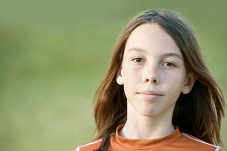 Young Teen Boy with Freckles and Long Hairの写真素材