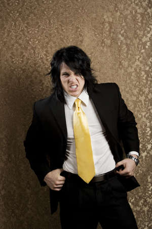 Handsome angry man in an aggressive stanceの写真素材