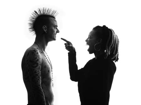 Man with Mohawk and Woman wearing Dreadlocksの写真素材