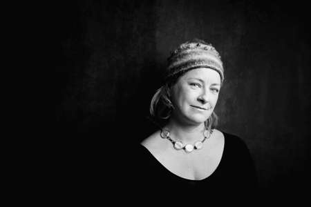 Attractive Woman in a Bright Knit Capの写真素材