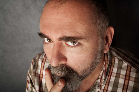 Closeup of a man in his forties with mustacheの写真素材