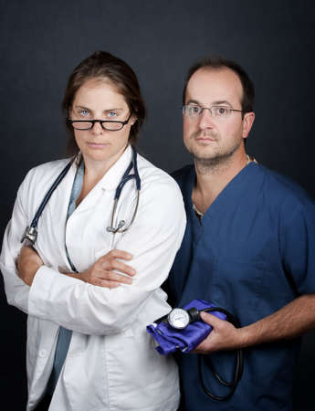 Portrait of male and female health care professionalsの写真素材