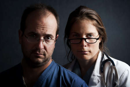 Portrait of male and female health care professionalsの写真素材