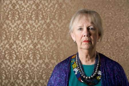 Closeup Portrait of an Eccentric Senior Ladyの写真素材