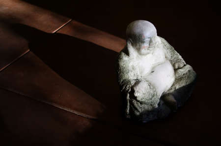 Concrete Buddha Statue in bright Afternoon Lightの写真素材