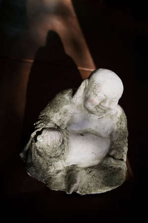 Concrete Buddha Statue in bright Afternoon Lightの写真素材