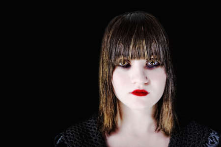 Closeup of Scary Young Girl with Dark Makeup