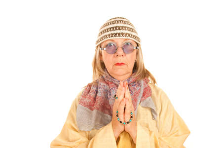 Crazy new age woman with beads in a yellow robeの写真素材