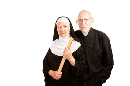 Portrait of angry priest and nun in blackの写真素材