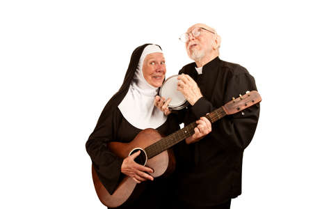 Portrait of funny musical priest and nun with instrumentsの写真素材