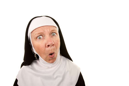 Funny Nun with Shocked Expression on her Faceの写真素材
