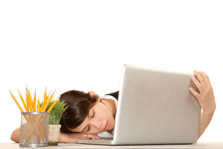 Pretty female office worker with laptop computerの写真素材