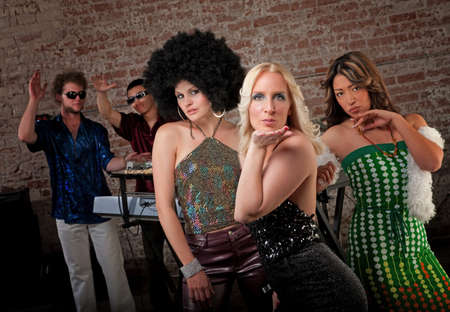 Ladies in Retro clothing at a 1970s Disco Music Party