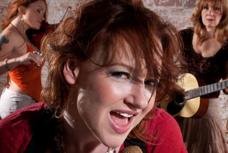 All-girl band performing in stylish clothing の写真素材