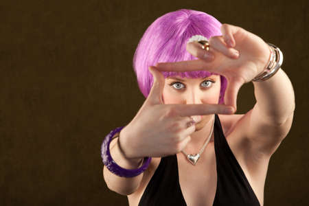 Portrait of woman with shiny purple hair