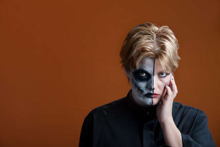 Woman wearing a scary makeup for Day of the Deadの写真素材