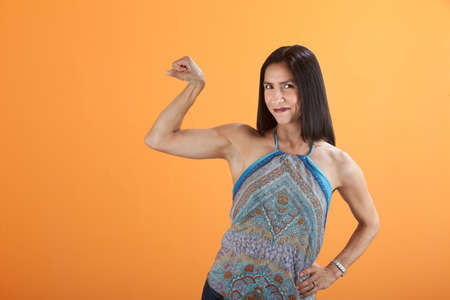 Gorgeous Latina woman showing off her biceps