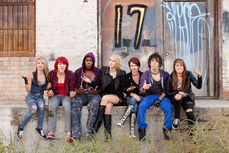 Young teen punks angrily respond to having their photo taken. Young teen punks angrily respond to having their photo taken.
