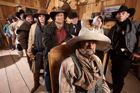 Serious customers in classic old American west saloon