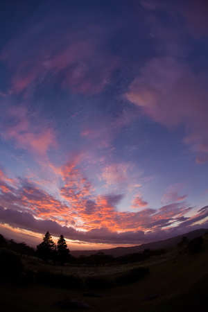Colorful sunset and clouds in Central American wildernessの写真素材