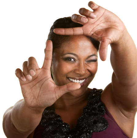 Upbeat Black woman using a framing gestureの写真素材