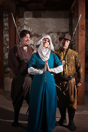 Two renaissance character men teasing righteous nun