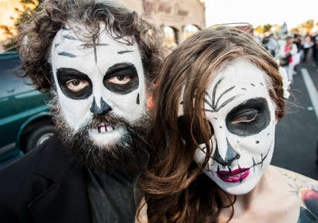 TUCSON, AZ/USA - NOVEMBER 09: Two unidentified people in dramatic facepaint at the All Souls Procession on November 09, 2014 in Tucson, AZ, USA.のeditorial素材