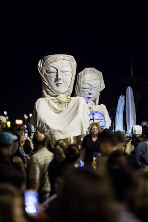 TUCSON, AZ/USA - NOVEMBER 09: Unidentified people with large asian faces in the All Souls Procession on November 09, 2014 in Tucson, AZ, USA.のeditorial素材