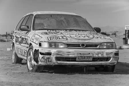 CALIPATRIA, IMPERIAL COUNTY, CALIFORNIA, USA - NOVEMBER 28: Bible car outsider art installation at Salvation Mountain on November 28, 2014 in at Calipatria, California, USA.のeditorial素材