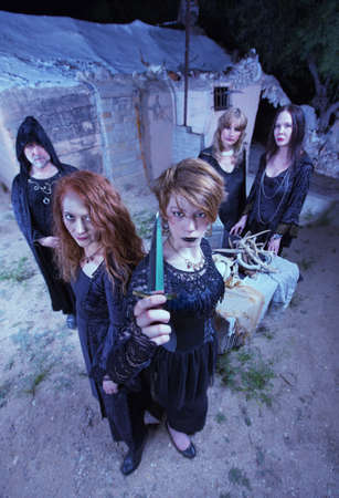 Group of witches with dagger in sacrifice ritualの写真素材