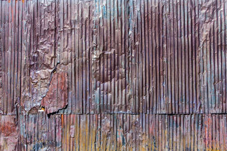 Rusty and weathered corrugated metal texture patternの写真素材