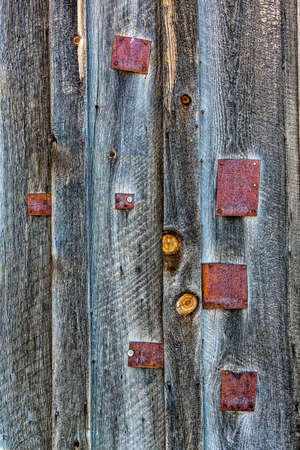 Weathered barn wood and metal patch texturesの写真素材